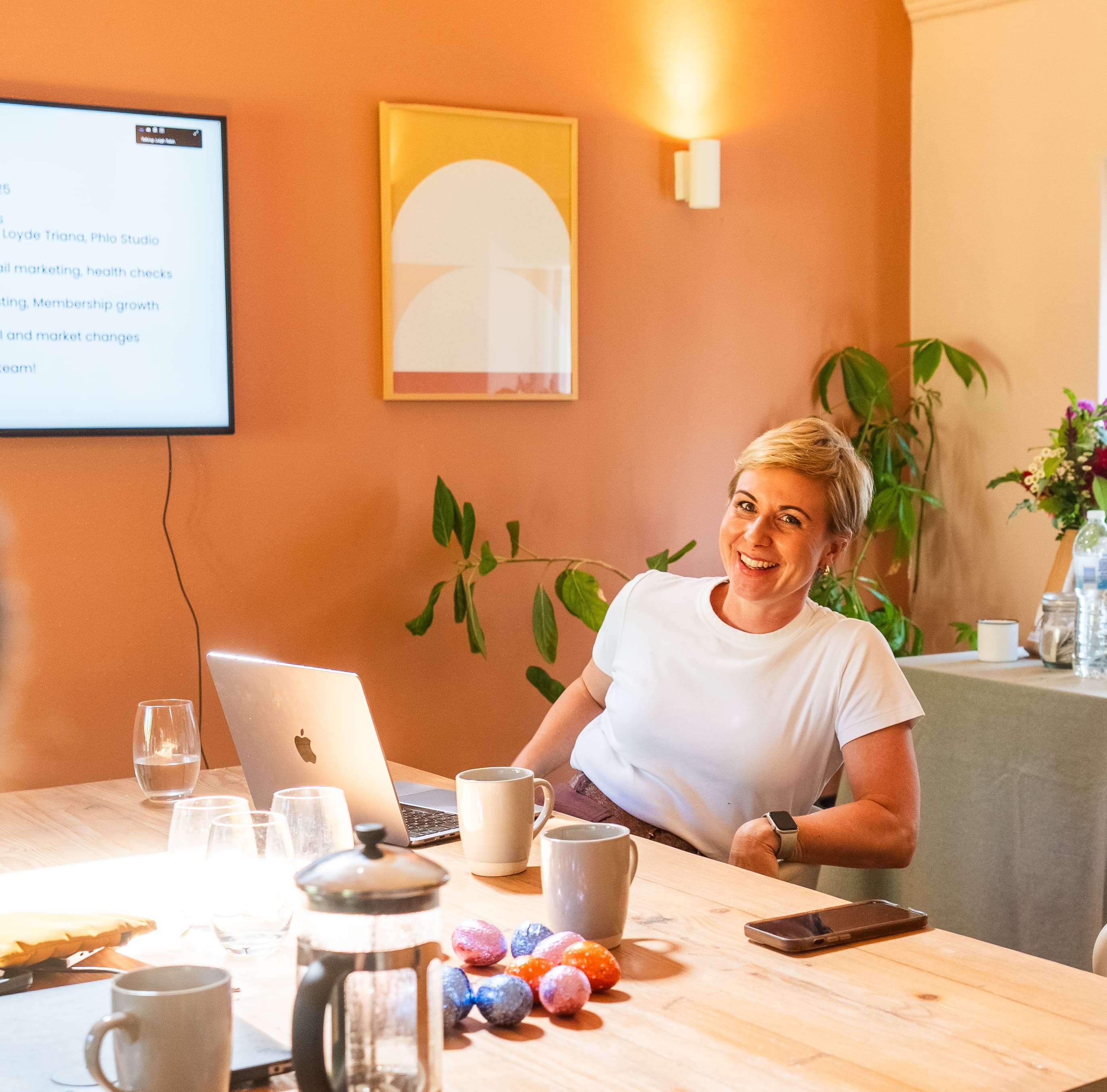 Leigh coaching at her desk